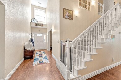 Spacious entry way that has lots of natural light