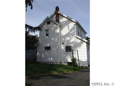 Exterior Back. As you can see, home is well taken 