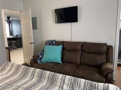 Bedroom with wood finished floors