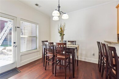 Dining area featuring dark hardwood / wood-style f