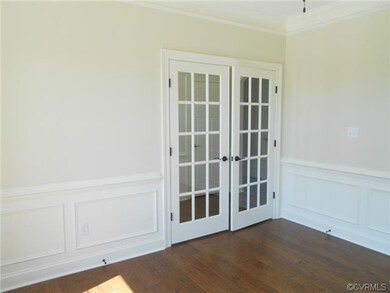 French doors leading to office/study and then into