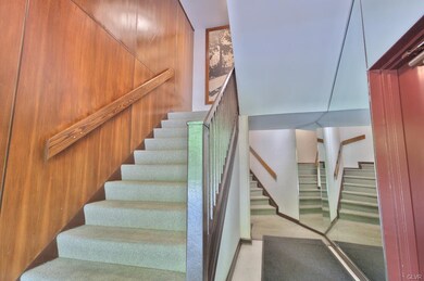 Stairs on left to #14; Interior garage entrance to