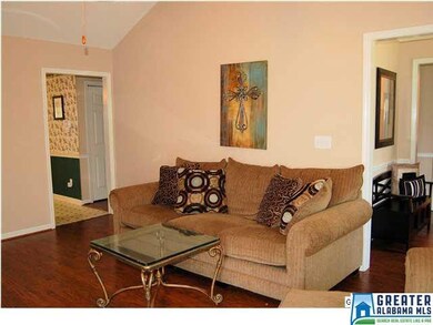 It has a large great room with a vaulted ceiling &