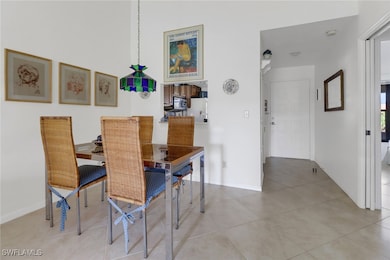 Dining room featuring light tile patterned floors