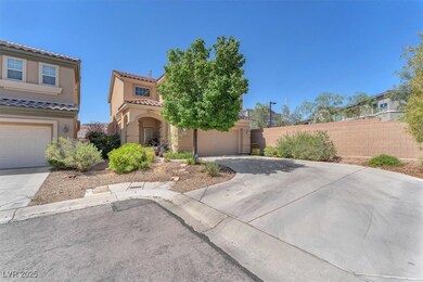 View of front of property with concrete driveway,