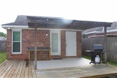 Covered Patio & Deck Area