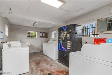 Laundry room with washing machine and dryer