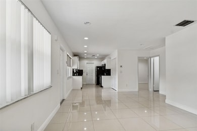 LARGE TILED FLOOR THROUGHOUT 
SPACIOUS SIZED LIVING-DINING AREA.