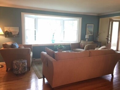 Formal livingroom adjoins the large foyer with cer