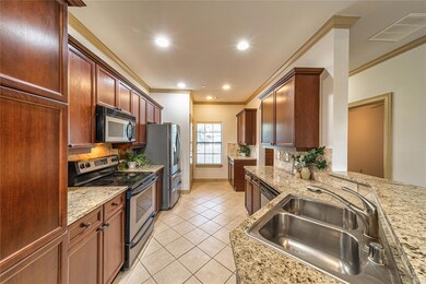 Galley kitchen open to dining room