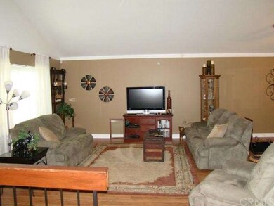 Living room from wide double door entry.