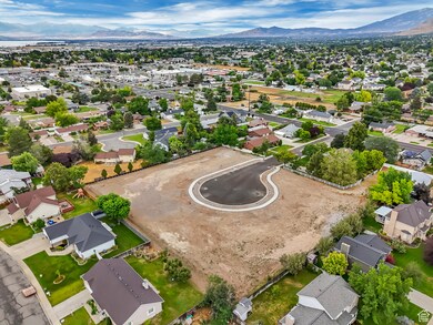 Aerial view of residential area with a mountainous background