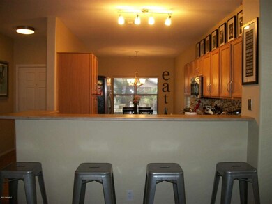 BREAKFAST BAR LOOKING TO FRONT OF HOUSE