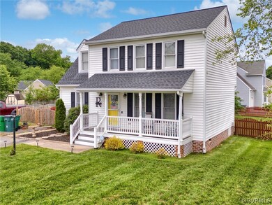 View of front of property featuring a front yard a