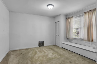 Second bedroom has built in window seat and storag