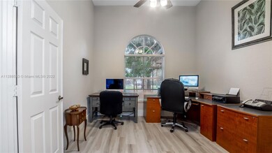 This room is currently used as an office but it is a bedroom with closet.  YOUR CHOICE