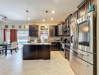 1303 Sea Pines Way, Davenport, FL 33896 - photo 5