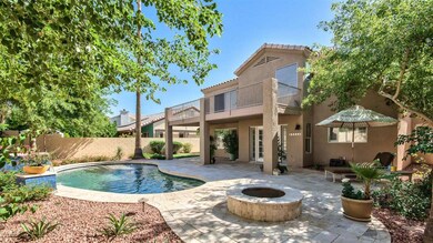 Pool with water feature & firepit