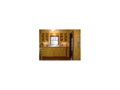 kitchen with custom cabinets including sub zero fr