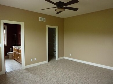 Master with walk-in closet.