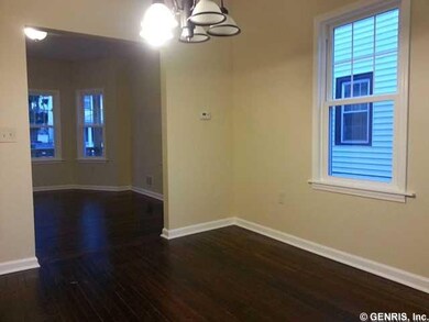 Living Room. The dining and living rooms adjoin fo
