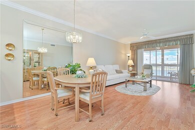 Dining area with wood finished floors, ornamental