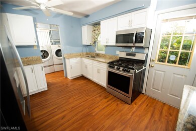 All appliances stay in this large kitchen