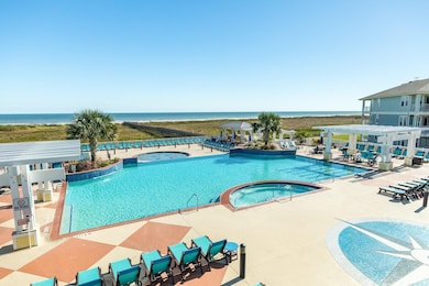 Resort style pool with breathtaking beach views.