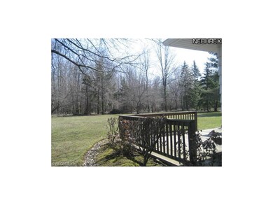 Relax on this large deck overlooking private yard 