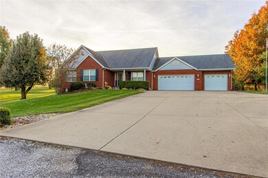 Three car garage and extra parking