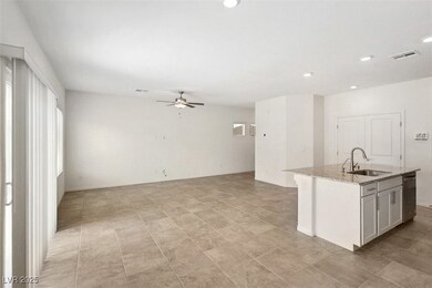 Kitchen featuring light stone countertops, ceiling