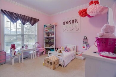 Bedroom #2 is currently being used as playroom and has a walk in closet and lots of natural light!  