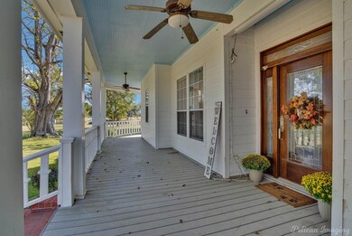 Deck with covered porch and ceiling fan