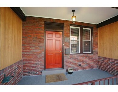 Exterior Front. Front porch has hardwood privacy p