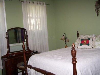 14X12 with decorative fireplace.