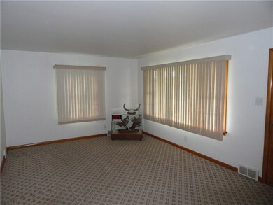 Large living with newer carpet.
