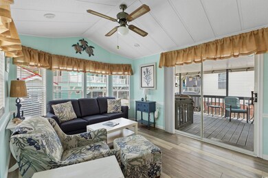 Living room with vaulted ceiling, wood finished fl