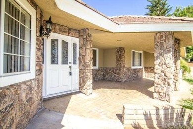 front door and tiled entry