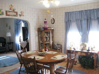 Dining Room has wood floors and lots of windows.