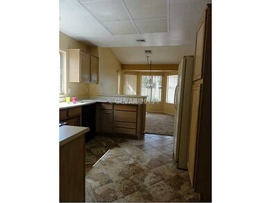 Property Photo. KITCHEN WITH CUSTOM TILE