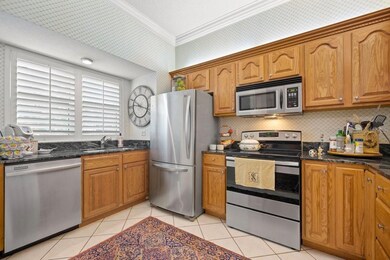 Stainless Steal Appliances, Granite Counter Tops, and Custom Plantation Shutters
