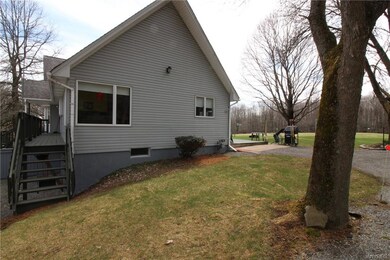 Notice the driveway coming up to the back deck all