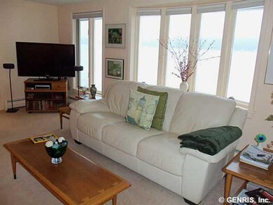 Living Room Wall of Windows to View the Lake!