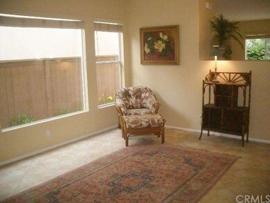 LIVING ROOM WITH TILE FLOORING, NEW PAINT