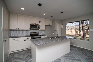Beautiful kitchen has a 6 foot island with breakfa