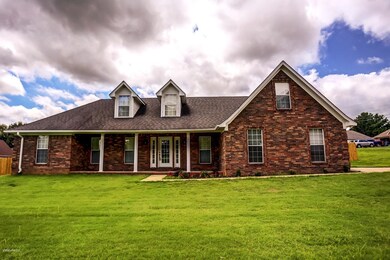 View of front of house featuring a front yard