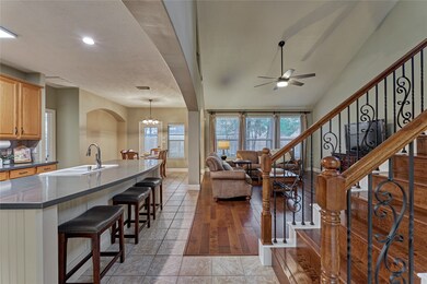 Open concept with updated stair railing.