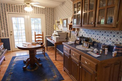 The Eat-in area off of the kitchen with built in cabinets for extra storage space.