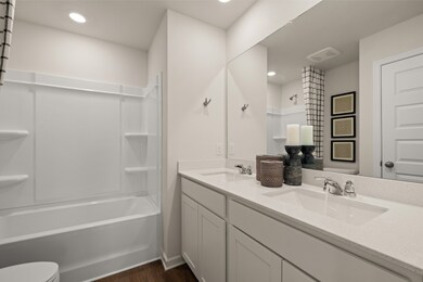 Picture is of a model in another community, not actual homesite