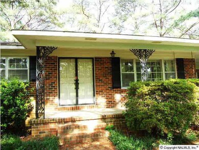 The front entrance is a lovely covered front porch!